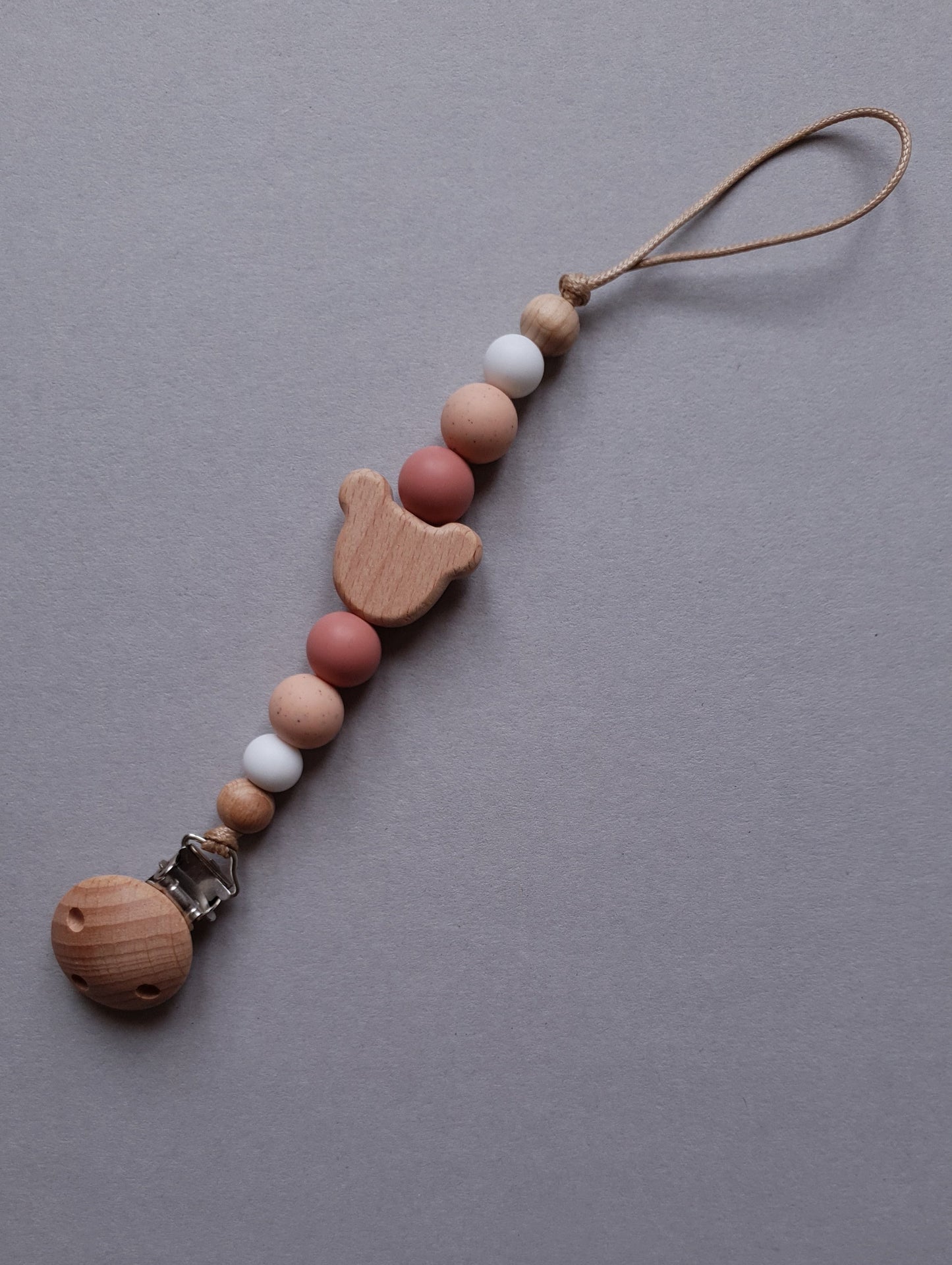 Portaciuccio Neonato in Legno Naturale e Silicone